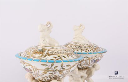 null Pair of white porcelain and biscuit perfume burners with polychrome decoration...