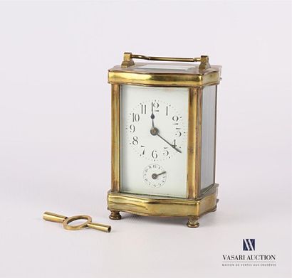 null Officer's travel clock in gilded bronze and brass with a moving rectangular...