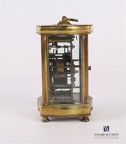 null Officer's travel clock in gilded bronze and brass with a moving rectangular...