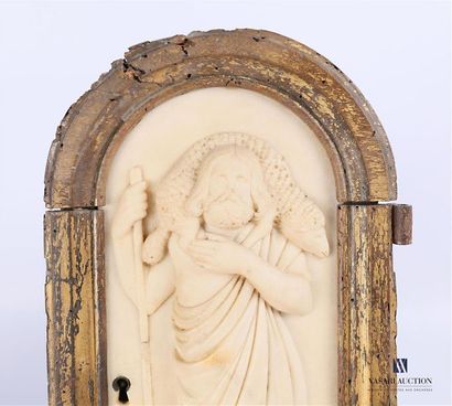 null Tabernacle door in moulded and gilded wood decorated with an alabaster carved...