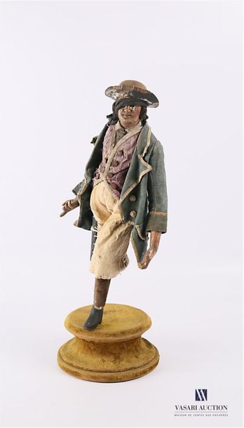 null Carved wooden subject depicting a pirate in uniform, articulated limbs, glass...