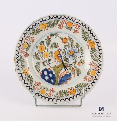 null DELFT
Earthenware plate with polychrome decoration in the basin of a trendy...