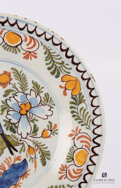 null DELFT
Earthenware plate with polychrome decoration in the basin of a trendy...
