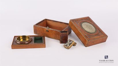 null A necessary wooden smoker's box covered with fawn leather, the lid decorated...
