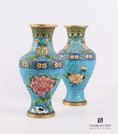 null Pair of baluster-shaped vases in partitioned enamels, the belly with polychrome...