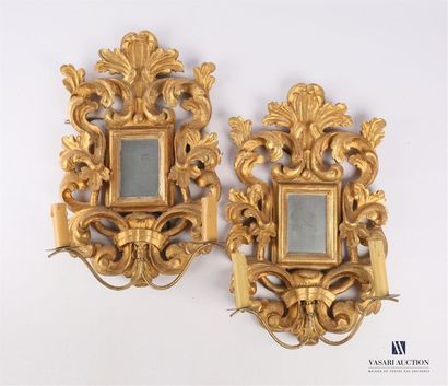 null Pair of gilded wooden wall lights with two arms of light, the shaft has a rectangular...