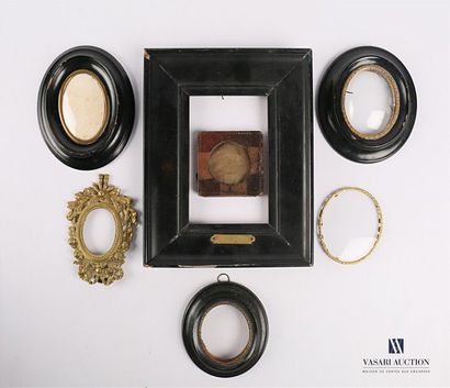 null Set of seven miniature frames, one in bronze, one covered with leather and four...
