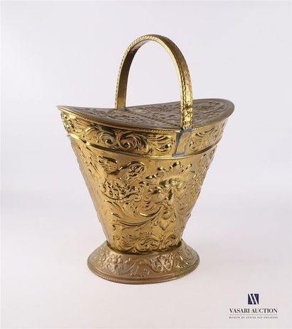 null Ash bucket in repoussé brass with a truncated conical shape resting on a pedestal...