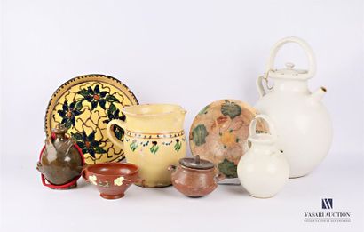 null Glazed earthenware and terracotta set including a dish decorated with flowers...