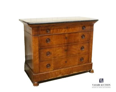 null A chest of drawers made of mahogany veneer, it opens on the front with four...