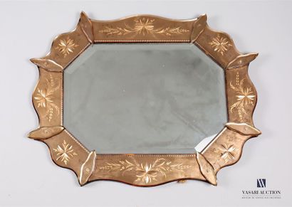 null Oval wooden mirror with octagonal view, the border decorated with glass plates...