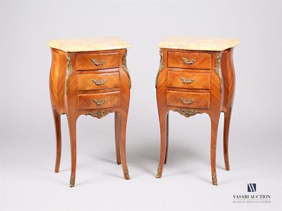 null Pair of bedside tables with curved fronts and sides made of rosewood veneer...