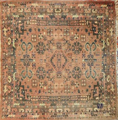 null MIDDLE EAST Square wool 
carpet with geometric and floral motifs on a brick
base...