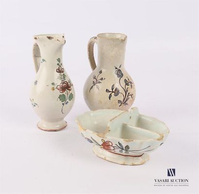 null SAMADET - SOUTH WEST
Two earthenware pitchers with floral
decoration 18th century...
