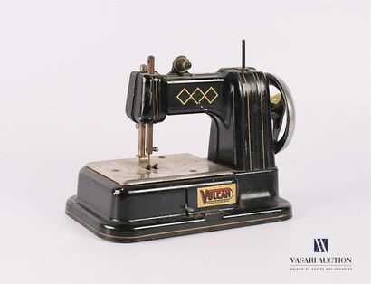null Sewing machine with a plastic wheel and black lacquered pads with net and diamond...