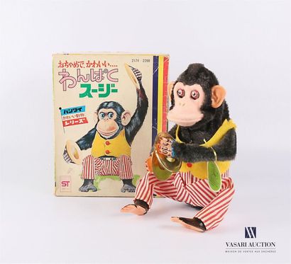 null BANDAI - Japan 
" Musical Jolly Chimp " Toy representing a sign with a yellow...