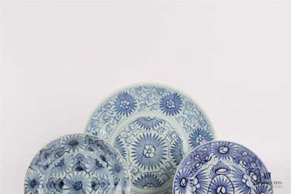 null CHINA
Set including one dish and two plates with blue-white decoration of stylized...