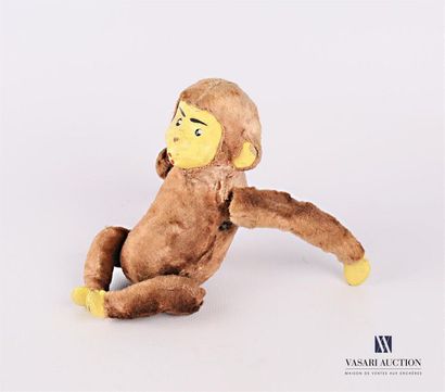 null Mechanical monkey, motor with key, in action the monkey turns the arms
(cracks...