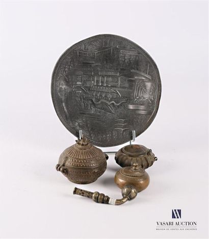 null ASIA
Lot comprising three metal betel tins, one with a lid surmounted by a stylized...