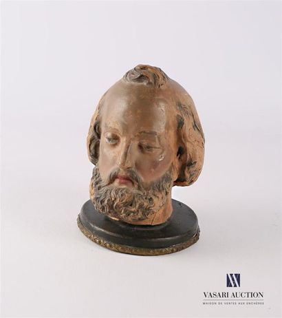 null Head of Saint John the Baptist in polychrome terracotta fixed on a
19th century
wooden...