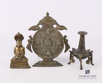 null Set of three bronze pieces comprising a subject representing Gautama Buddha...