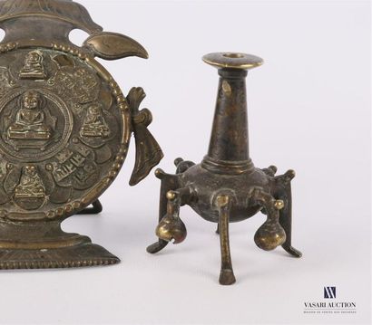 null Set of three bronze pieces comprising a subject representing Gautama Buddha...
