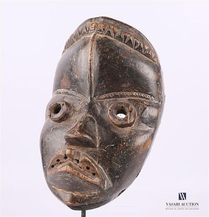 null WEST AFRICA - LIBERIA
Wooden
Dan mask Metal 
base 50
's Height of mask: 26 cm...
