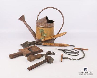 null Set of tools comprising: a copper-plated metal watering can with painted map...