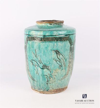 null Turquoise glazed terracotta vase decorated with birds registered in reserves...