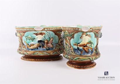 null Two earthenware planters with polychrome decoration of syrenes straddling a...