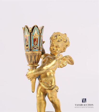 null Sujet en bronze doré et émaillé représentant un angelot céroféraire sur un socle,...