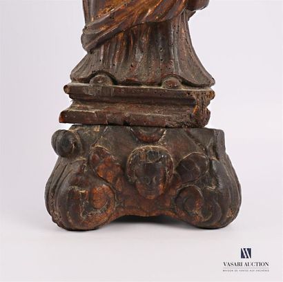 null Virgin and child in gilded wood resting on a tripod base decorated with cherubs...