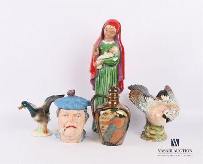 null Ceramic lot comprising a glazed terracotta subject representing a virgin with...