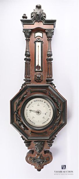 null Barometer-thermometer in blackened moulded natural wood, it has in its lower...