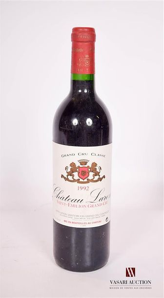 null 1 bouteille Château LAROZE	St Emilion GCC	1995

	Et. à peine tachée. N mi g...