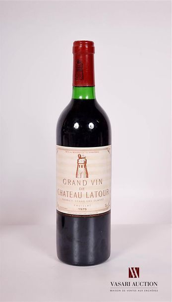 null 1 bouteille	Château LATOUR	Pauillac 1er GCC	1979

	Et. légèrement tachée par...