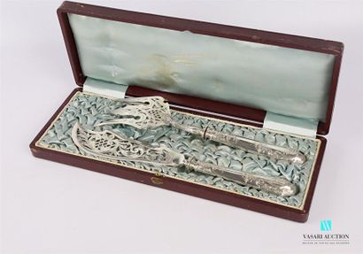 null Fish service cutlery, the silver handle decorated with leafy branches and scrolls,...