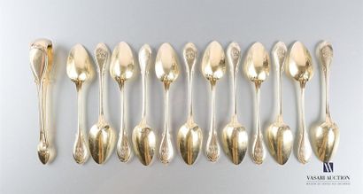 null Suite of twelve teaspoons and one sugar tongs in gilded silver decorated with...