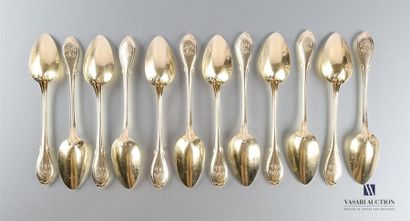 null Suite of twelve teaspoons and one sugar tongs in gilded silver decorated with...