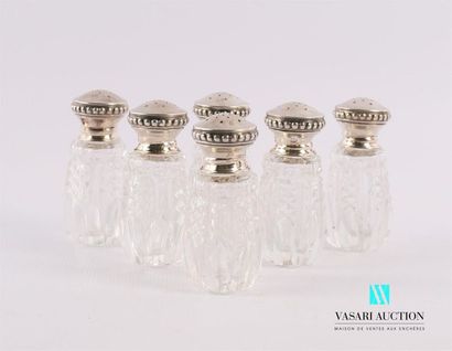 null A suite of six crystal salt shakers decorated with diamond points, the silver...