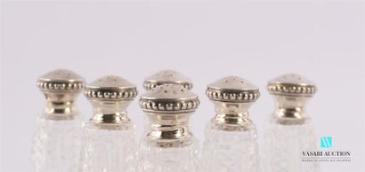 null A suite of six crystal salt shakers decorated with diamond points, the silver...