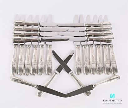 null Set of twelve table knives and twelve dessert knives, silver handles decorated...