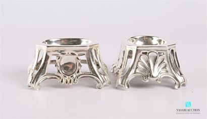 null A pair of silver salt shakers of rectangular shape with cut-off sides, the openwork...