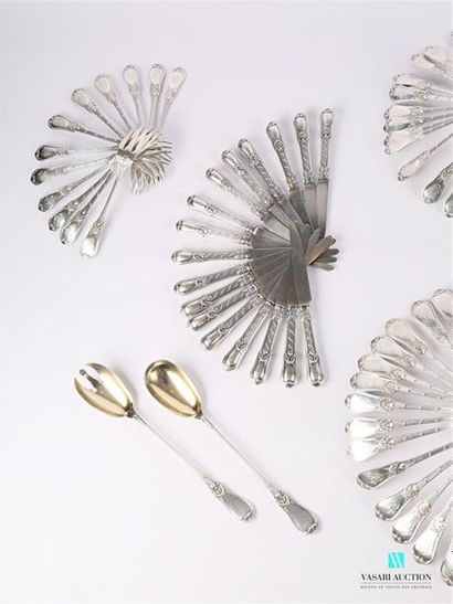 null A household silverware with slightly violin-embellished handles decorated with...