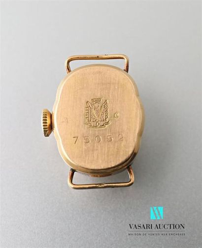 null Watch case in 750 thousandths yellow gold, the champagne-coloured dial marked...