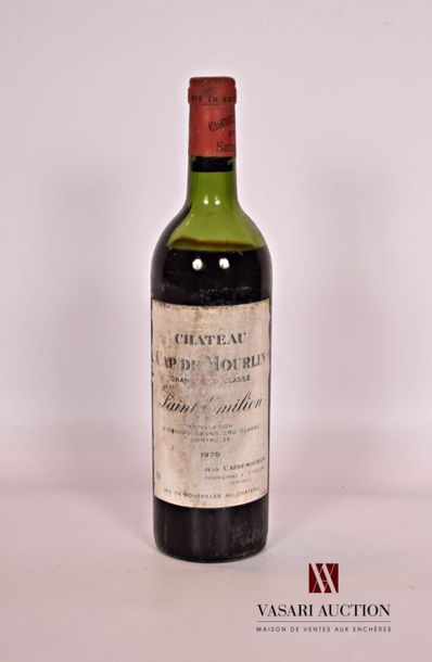 null 1 bouteille	Château CAP DE MOURLIN	St Emilion GCC	1975
	Et. fanée, tachée et...