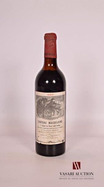 null 1 bouteille	Château MAGDELAINE	St Emilion 1er GCC	1967
	Mise négoce. Et. un...