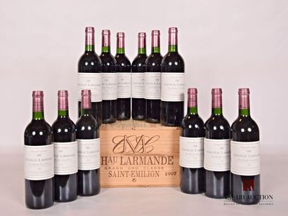 null 12 bouteilles	Château LARMANDE	St Emilion GCC	1997
	Et.: 11 excellentes, 1 à...