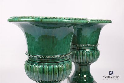 null Pair of Medici vases in green glazed terracotta decorated with a frieze of wavelets...