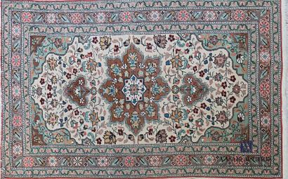 null TURKEY
- WOOL CARPETS Woollen rug decorated with a central medallion in the...